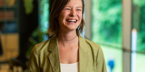 Woman smiling to her collegues 